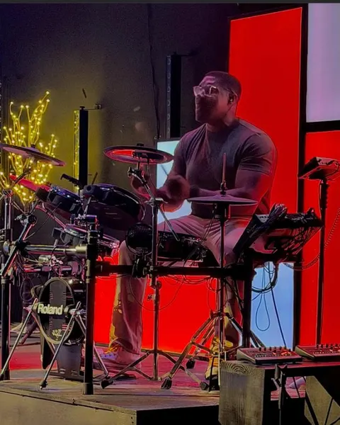 A drummer behind the kit during the service
